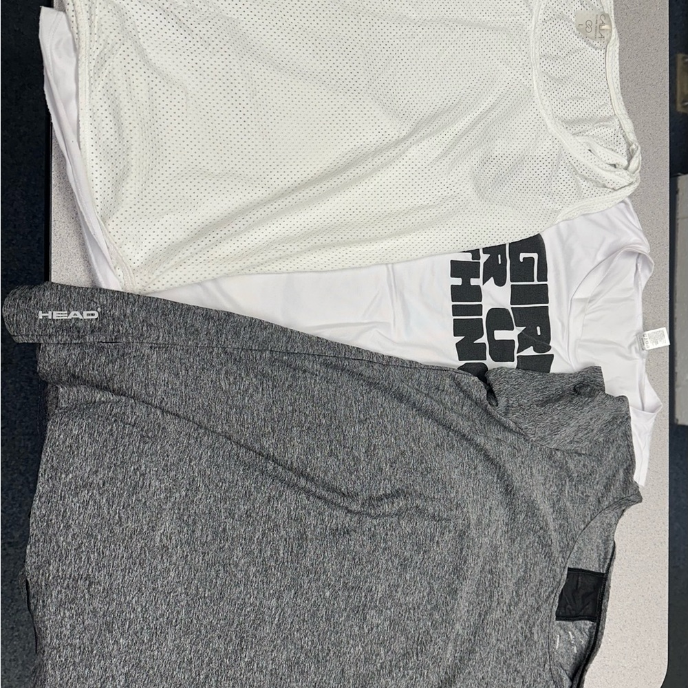 Bundle of women’s workout tops, size medium